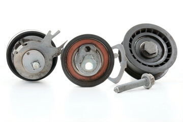 Obraz premium timing rollers set. used part detail of internal combustion engine