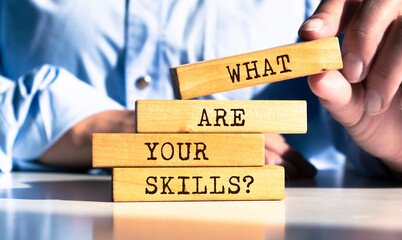 Wooden blocks with words 'What Are Your Skills?'.