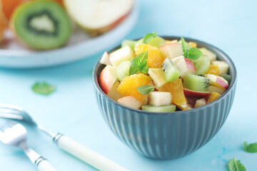 A bowl with fresh fruit salad