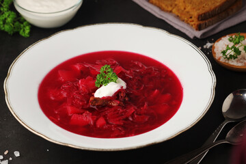 A plate with Ukrainian national dish - borsch