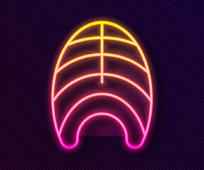 Glowing neon line Fish steak icon isolated on black background. Vector