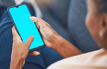 Black woman, hands and phone with green screen mockup for marketing, branding and advertising. African female hand on mobile technology with blank display for social media, texting and message or app