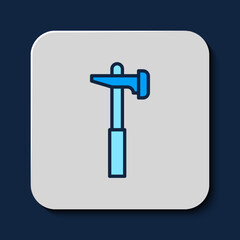 Filled outline Hammer icon isolated on blue background. Tool for repair. Vector