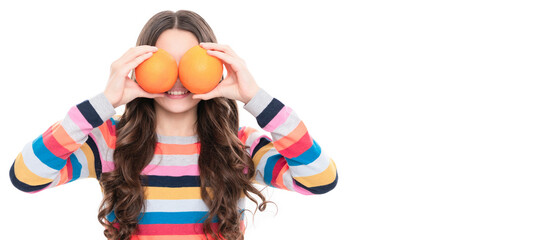 Fototapeta na wymiar look. vitamin and dieting. child eating healthy food. childhood health. citrus fruits. Child girl portrait with orange, horizontal poster. Banner header with copy space.
