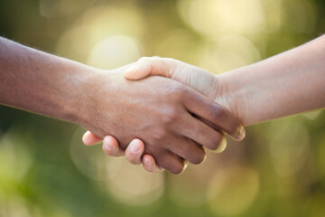 Community, handshake and support hand sign of diversity to show solidarity and trust. Welcome or...