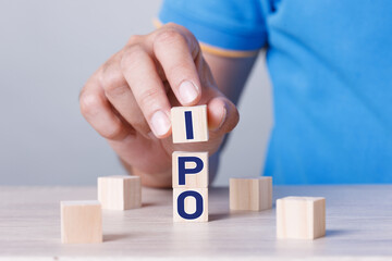 Busiiness Concept IPO Stack of wooden blocks with letters, Initial Public Offering IPO concept.