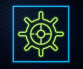 Glowing neon line Ship steering wheel icon isolated on brick wall background. Vector