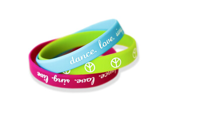 Bright bracelets with an inscription on a white background.