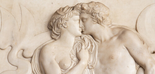 Ancient sculpture with kissing couple, Florence - Italy