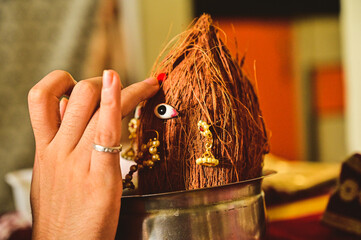 Making of Hindu Goddess Face. Red Mark Applying. Symbol of Hindu Religion. Holidays and Festivals....