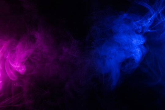 Waves of neon swirling blue and purple smoke dark abstract background