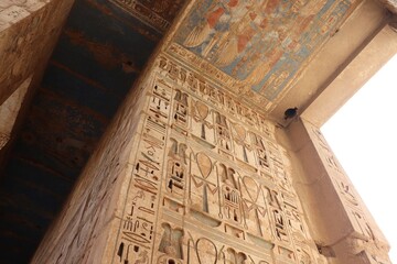 Beautiful pharaonic inscriptions carved on the entrance of Ramses III temple in Luxor (Medinet Habu...