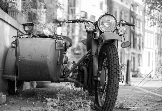 An old motorcycle in black and white