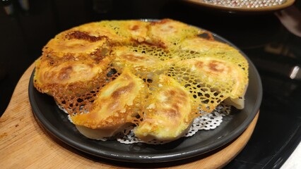 Closeup of Juicy Chinese Fried Potstickers,china