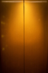 Closed elevator door with lighting