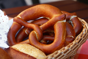 Close up pretzel bread and buns in basket