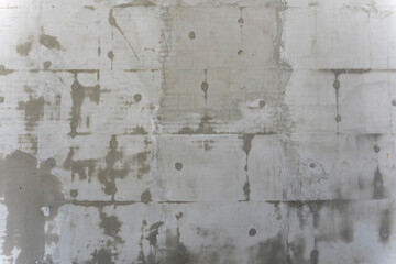 gray concrete textured background of the plastered wall of building