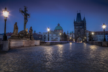 Fototapeta na wymiar Charles bridge illuminated at night, Medieval Prague, Czech Republic