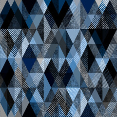 Seamless geometric rhombic textured pattern. Black, blue figures on a gray background.