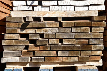 stacked, cracked wooden boards