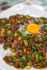 A plate of delicious and tempting nest egg minced beef rice in a Hong Kong-style tea restaurant