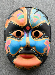 This mask is designed in many beautiful colors to be used in religious ceremonies. 