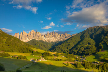 St. Magdalena with famous church in Val di Funes at sunset, Dolomites , Italy