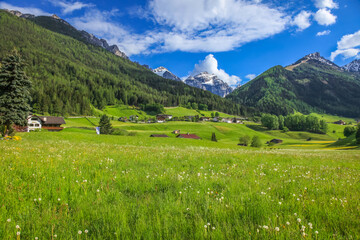 Alpine meadows in Stubai Valley and village, North Tyrol, Austria