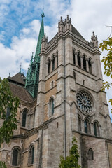 Fototapeta na wymiar Geneva, switzerland- august 2022: Tower of the cathedral of Saint Peter, in the Swiss Calvinist city.