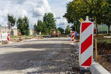Repair of town Street and preparation of the territory for laying new asphalt.Autumn day.
