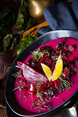 Red borszcz with dill and lemon