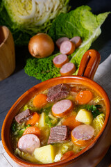 Delicious savoy cabbage stew in a rustic bowl
