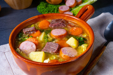 Delicious savoy cabbage stew in a rustic bowl