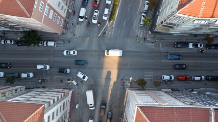 Aerial view of the evening traffic in the city center. vehicles and pedestrians can be seen.