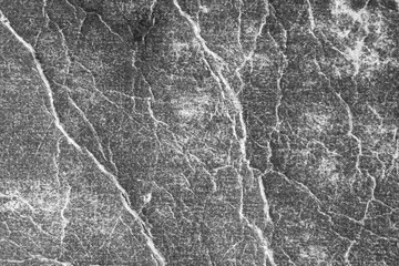 Gray grunge background with cracks.