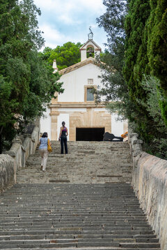 Two women climbing the 365 steps of Calvary to reach the Church of the Virgin of the Angels (patron saint of Pollen&ccedil;a)