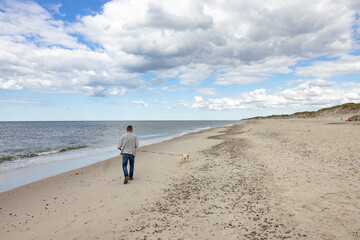 Waking on Sandy beach by Husby town. Populated place, Holstebro, Region Midtjylland, Denmark, Scandinavia, Europe