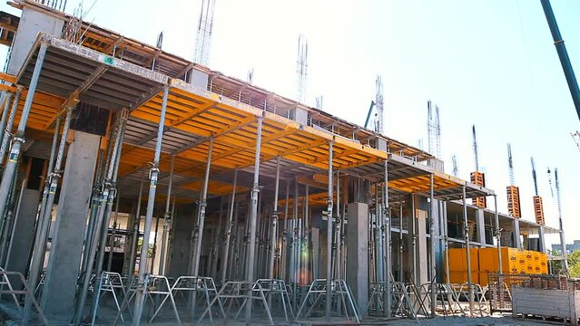 The process of creating a floor. Formwork flooring. Interior of a building under construction. Formwork rack