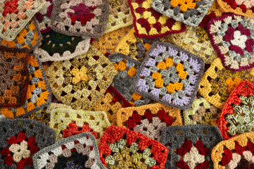 Granny squares. Colored wool knitting crocheting - obrazy, fototapety, plakaty