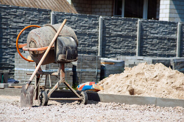 orange concrete mixer prepares cement mortar industry