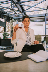 Business woman looking at her tablet