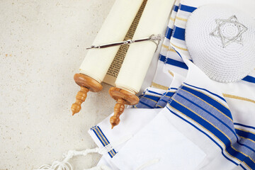 Simchat Torah. Jewish prayer book with torah scroll, prayer shawl tallit Orthodox religious symbols.