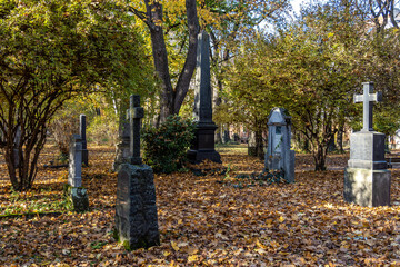 Naklejka premium View of famous Old North Cemetery of Munich, Germany with historic gravestones.