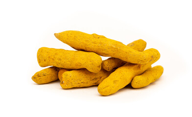 Turmeric root and powder on a white background close-up isolated. Useful spices, Indian roots and herbs. Medicinal folk ingredients for food.
