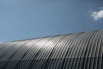 Fototapeta na wymiar Steel roof. Dome construction. Warehouse made of metal profile.