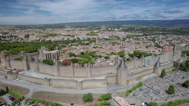 The drone aerial footage of Carcassonne medieval city and fortress castle, Southern France. 