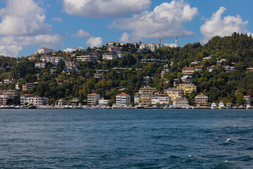 Fototapeta premium silhouette Istanbul city buildings from water Bosphorus or Golden Horn, public places.