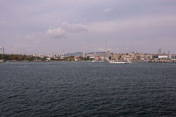 silhouette Istanbul city buildings from water Bosphorus or Golden Horn, public places.