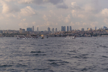 silhouette Istanbul city buildings from water Bosphorus or Golden Horn, public places.