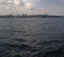 Obraz premium silhouette Istanbul city buildings from water Bosphorus or Golden Horn, public places.